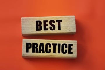 Best Practice written on wooden blocks, best practices for managing virtual teams concept