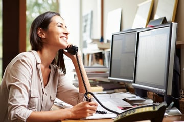 Female Architect Working At Desk On Computer-1