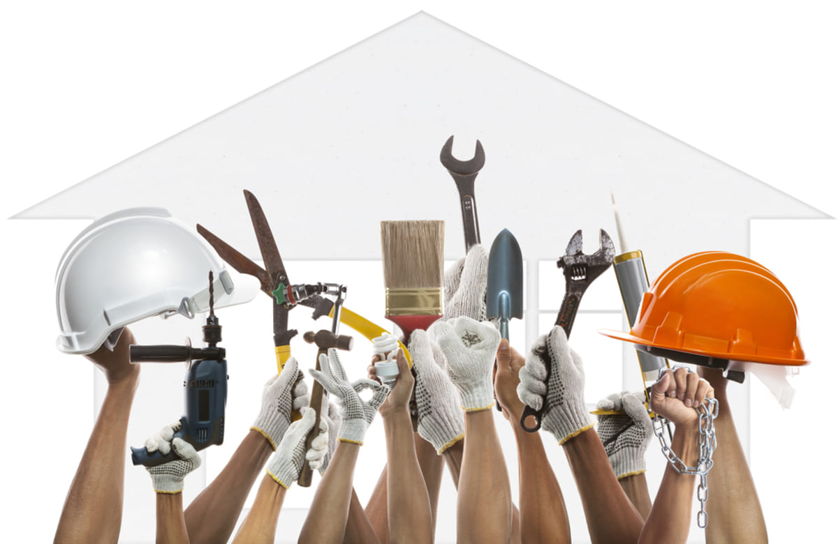 Hands holding tools in the air, property maintenance services concept