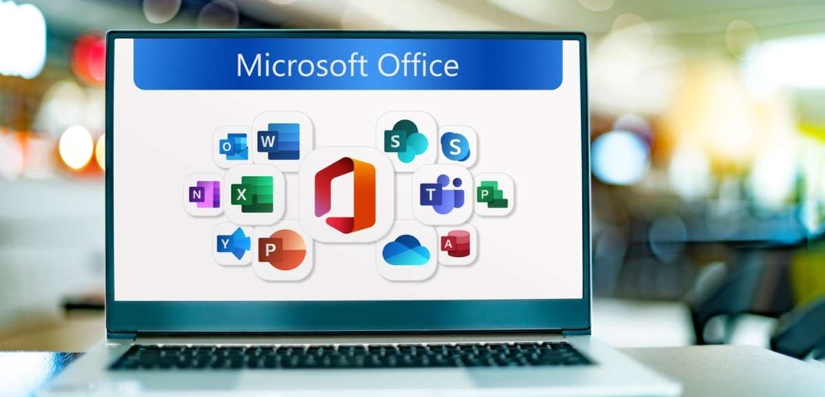Laptop computer displaying logos of Microsoft Office