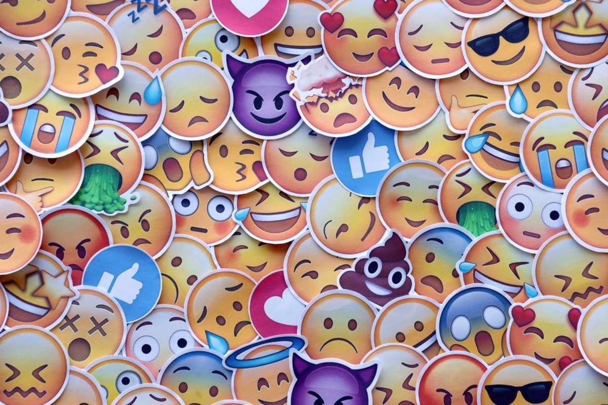 Many emojis in a pile; use emojis to communicate with a property management virtual assistant