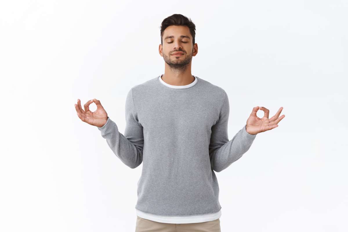 Mindful patient and relaxed young happy man