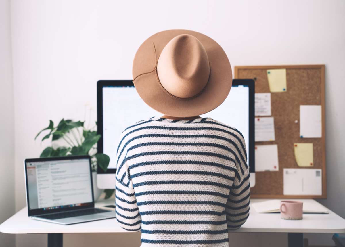 Woman working on computer at home office