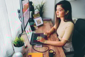 virtual assistant sitting on her desk
