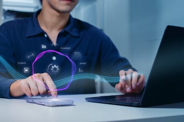 Young Adult Developing AI on Laptop Computers Young Adult Developing AI on Laptop Computers