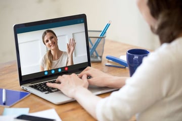Woman on a video call, real estate virtual assistant concept. 