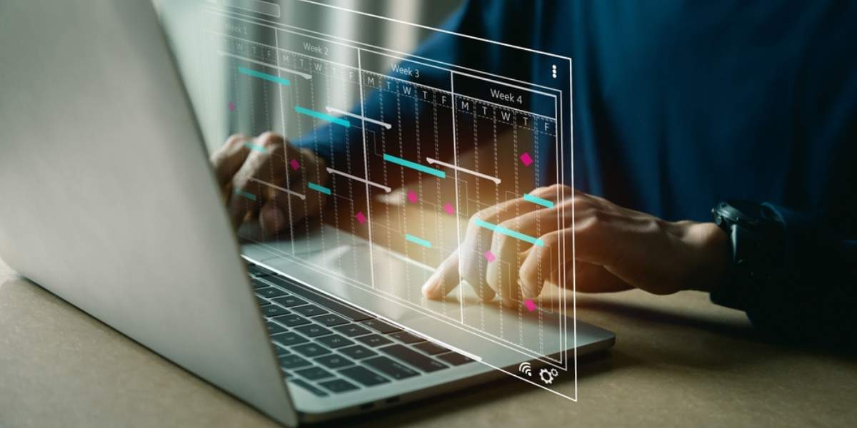 Project management concept , analyst working with computer in management system to make report with KPI and metrics connected to database