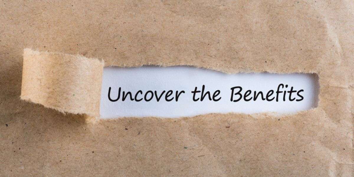 Uncover The Benefits text on brown envelope